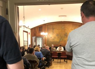 Meeting gets heated as council cuts town, school budgets