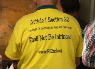 Residents divided on town’s gun resolution