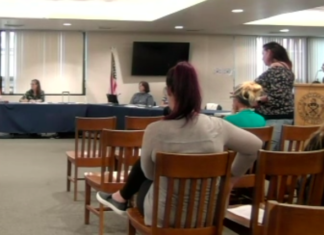 Burrillville school board takes first vote to change policy on face coverings