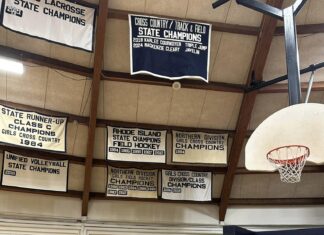 Two generations of achievement: Banners hang for father & daughter champion athletes at BHS