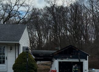 Two alarm fire guts breezeway & garage on Greenville Road