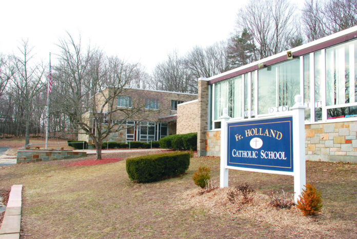 Housing developer purchases former Father Holland School in Burrillville