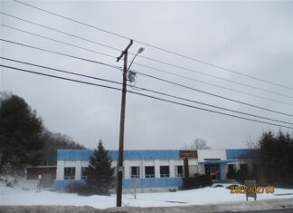 Developer who owns The Pines, Father Holland School buys former Tupperware building for $1.3 million