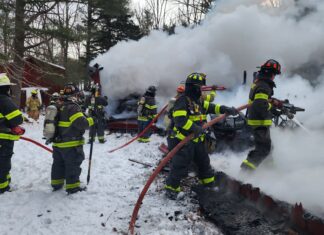 Early morning fire destroys garage at Harmony Products